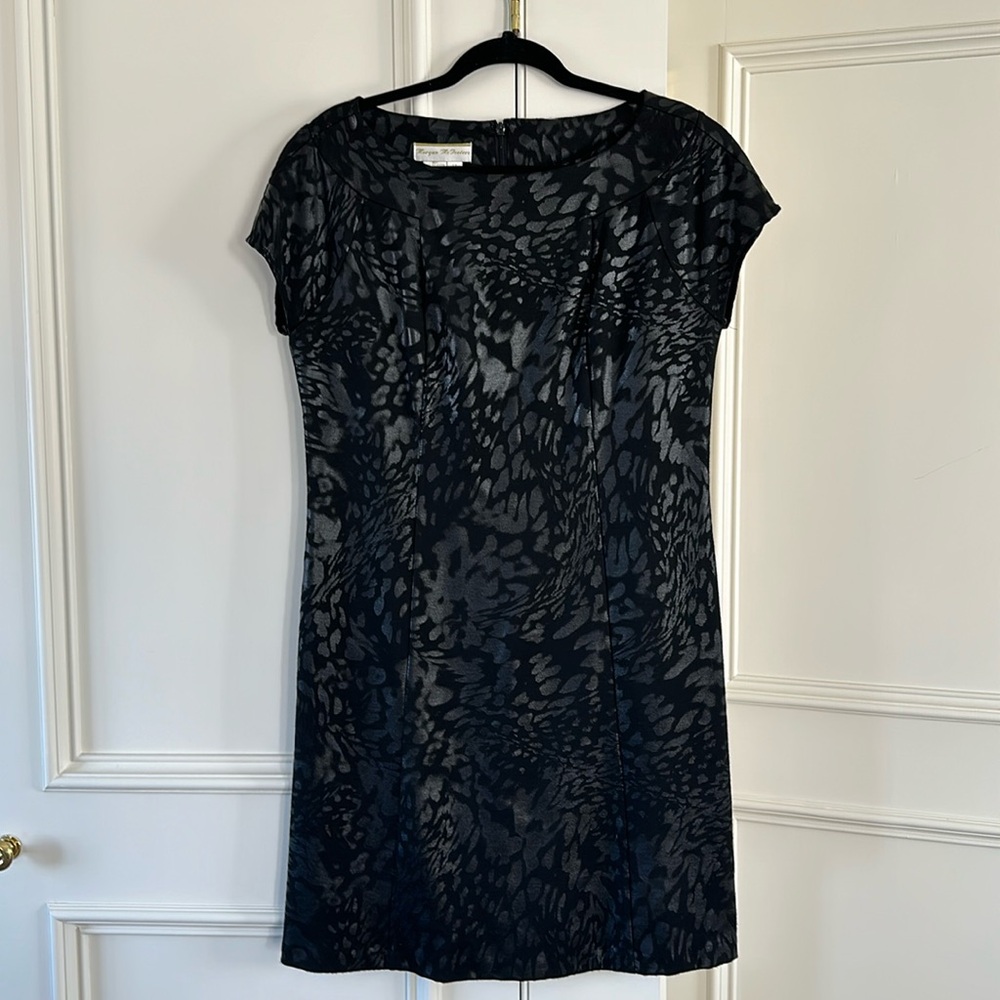 Black dress that has stretch very classic with an animal print sheen
